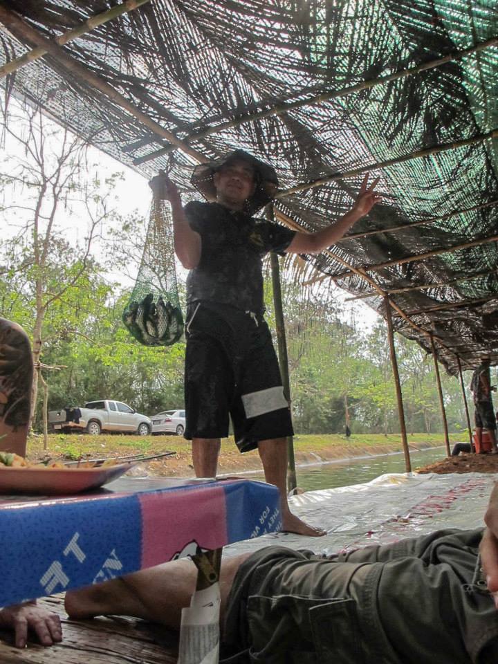 a man with a net full of fish