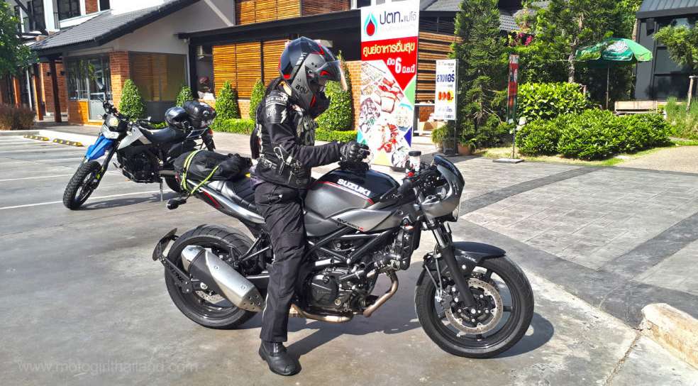 Lady motorcycle rider on a Suzuki