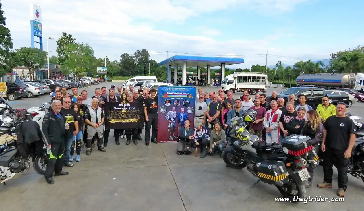 group of people with a sign