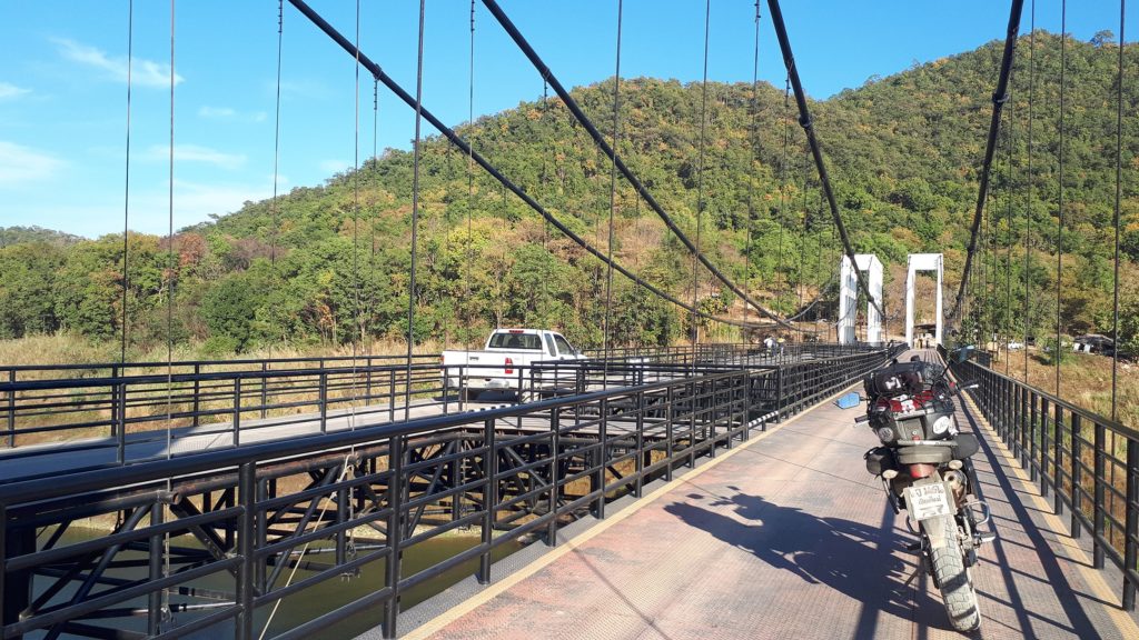 suspension bridge and motorbike