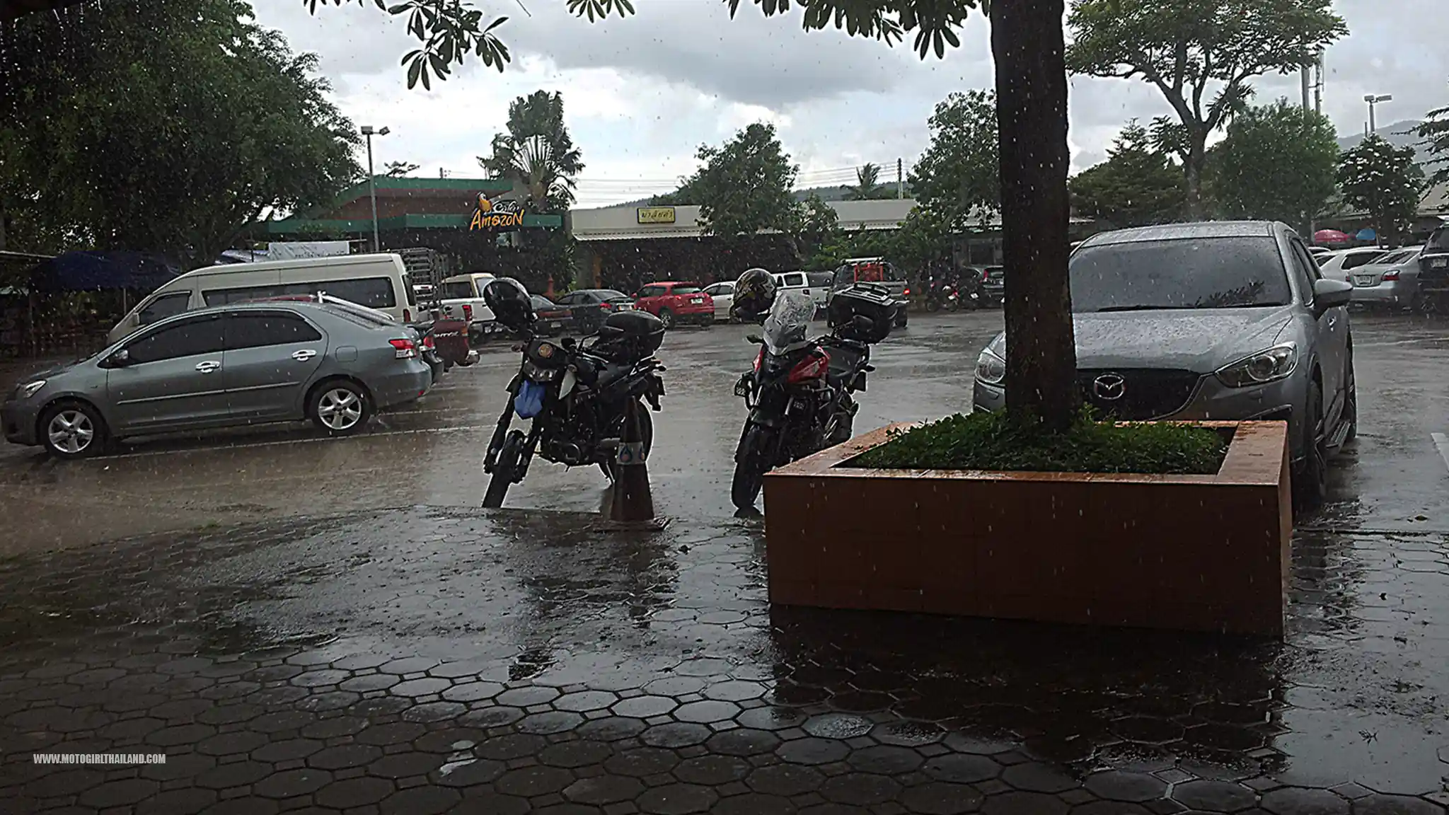 Wet carpark with motorcycles