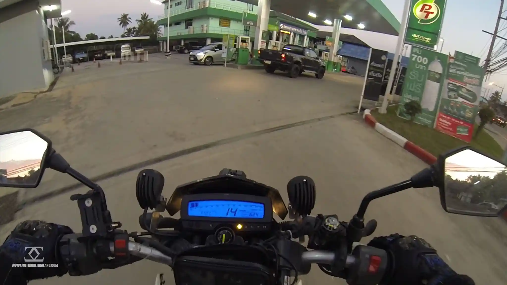 Pulling into Petrol Station on a Motorcycle