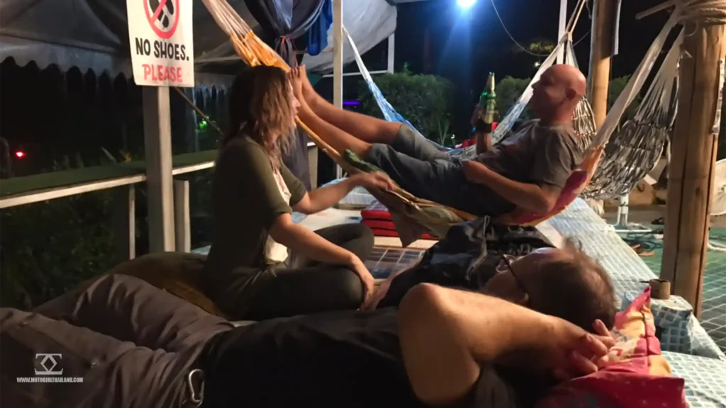three people in hammocks