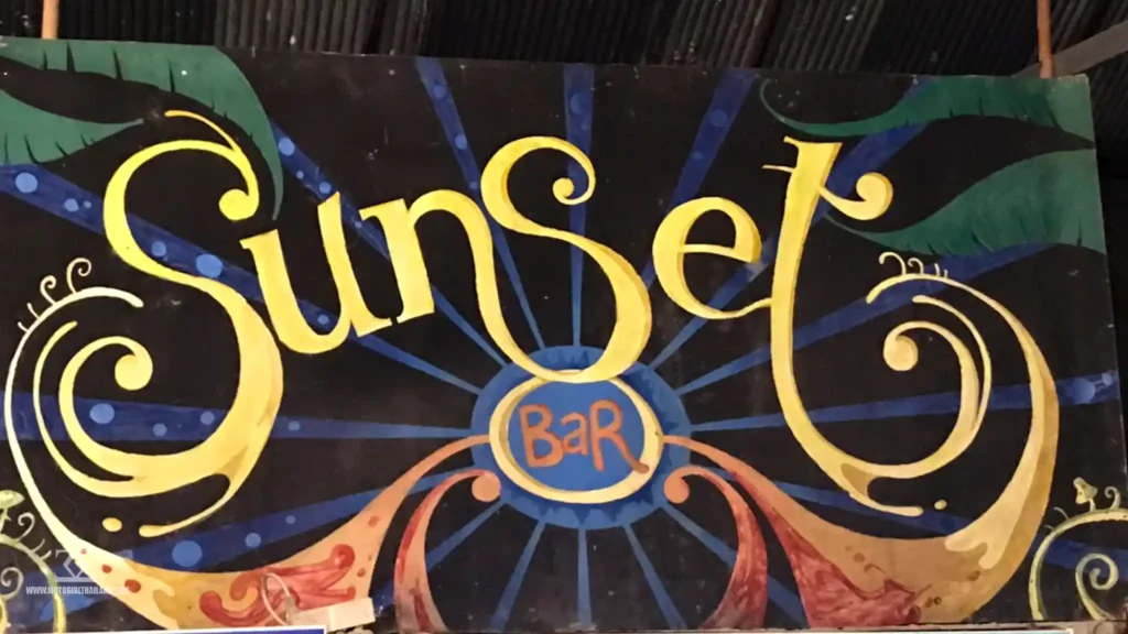 a sign saying Sunset